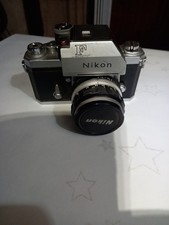 Nikon F Camera With Lense
