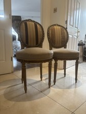 Antique Style Louis XVI Inspired Side Chairs With A Touch Of Nigeria.