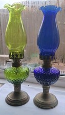 Pair of coloured oil lamps