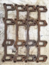 Rover V8 exhaust manifold bases.