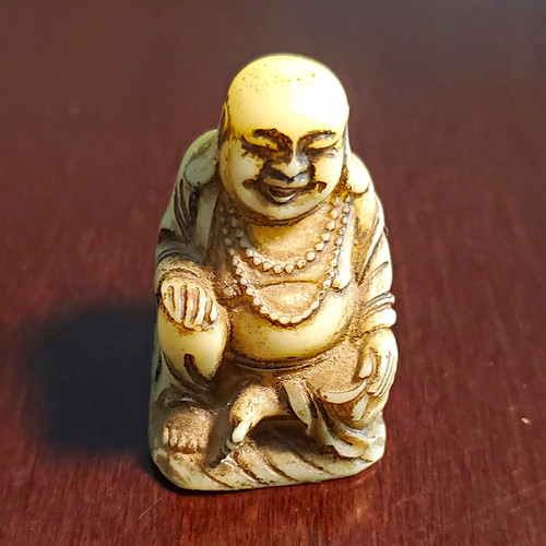 Small carved laughing buddha - laughing,