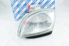 FRONT LEFT PROJECTOR HEADLIGHT