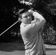 Golfer Peter Alliss swinging