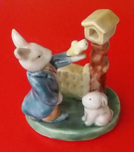 Figurine rabbits with bird - rabbits,