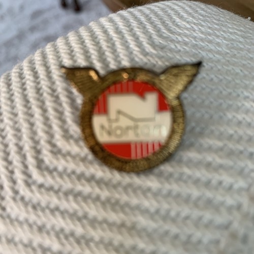 Norton enamel badge two small