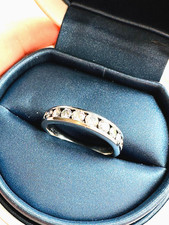 A Very Stunning 9 Diamond Platinum Ring (Size R)  (1 Carat)