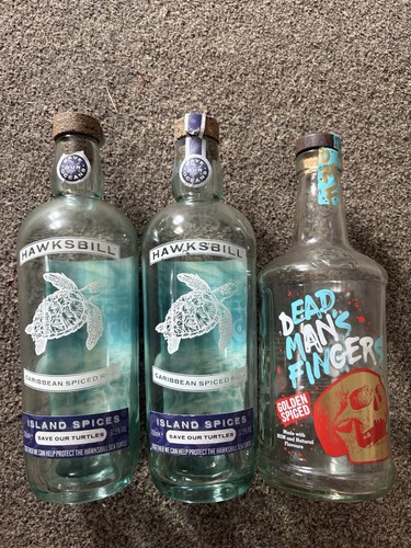 Empty spiced rum bottles - spiced,