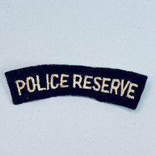 VINTAGE BSAP BRITISH SOUTH AFRICA POLICE RESEVE CLOTH SHOULDER TITLE BLUE