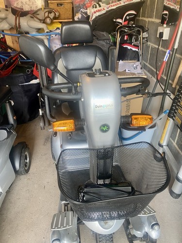 Two electric mobility scooters - mobility,