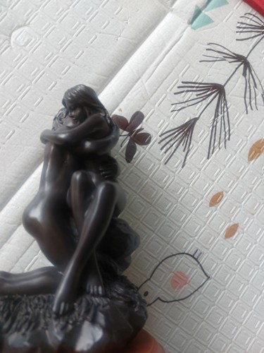 Figurine often titled the - often,