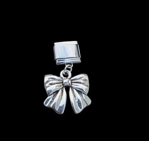 New silver bow dangly - new,