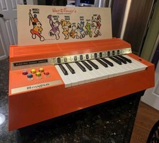 Vintage 1974 Orange Magnus