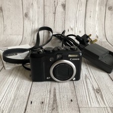 Canon PowerShot G7 Digital Compact Camera w Battery/Charger Memory Card & Manual