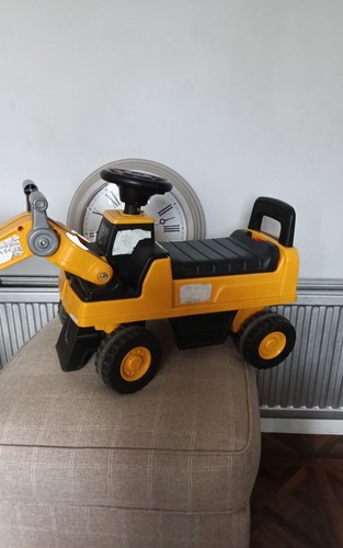 Children ride digger - on,