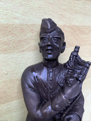 Coal figure seated - coal,