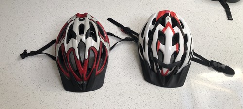 Pair giro cyclists helmets - of,