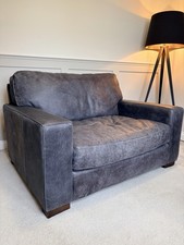 Black Leather Cuddler Armchair