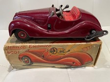 Vintage 1950/60 Schuco Examico 4001 car in Maroon with original box original key