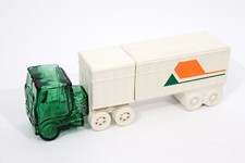 Avon Highway King Windjammer aftershave bottle and talcum powder truck.