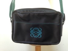 Vintage Loewe (Perfumes?) shoulder bag, black fabric, teal webbing strap