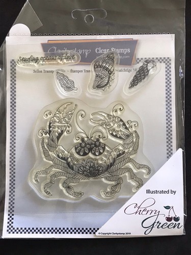 Crab under the sea shells - under,