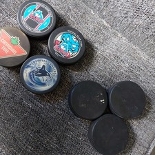 Official ice hockey pucks - x,