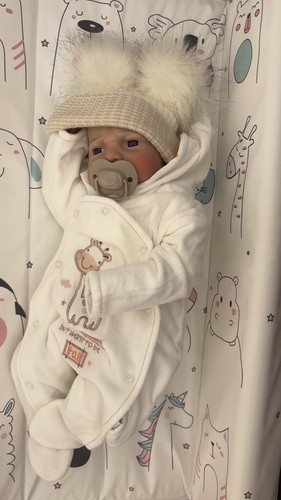 Weighted grumpy reborn baby