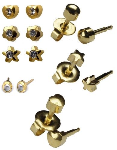 Ear piercing studs gold - ear,