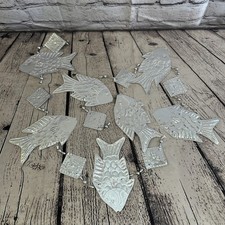 Aluminium Stamped Sitting Fish