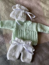 Hand Knitted dolls clothes to