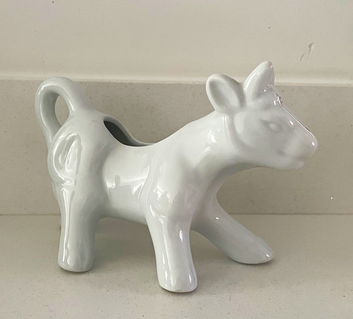 White glossy ceramic cow - ceramic,