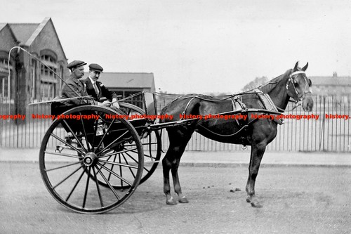 F014565 two men sit horse - two,