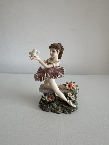Ballerina holding dove resin - ballerina,