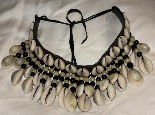 Hanging cowrie shell - shell, braided