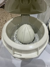 Magimix citrus press attachment for a food processor.