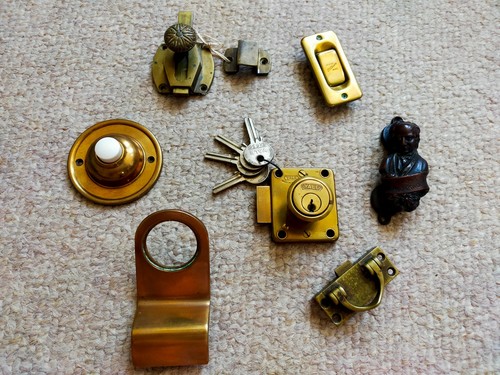 Collection old brass door - a, of