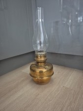 vintage brass oil lamp with a