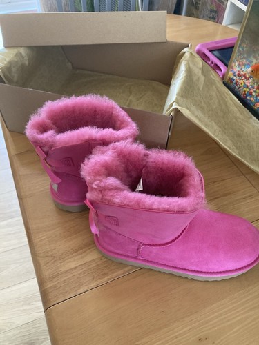 Brand new pink bow ugg - brand,