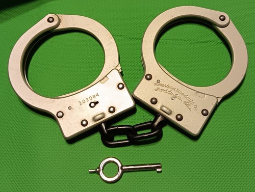 American handcuff company - american,