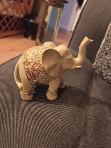 Upturned trunk elephant - upturned,