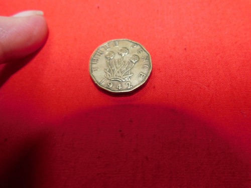 Collectable three pence - three,