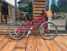 Islabikes Beinn 20 Pink Unisex Kids Bike With basket And bell.