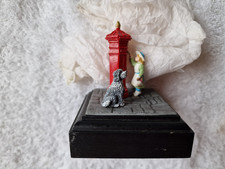 Cast metal Miniature: Posting a letter in a Victorian letter box