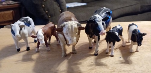 Lot plastic cows - of,