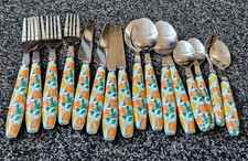 16 piece cutlery set oranges/lemons/white flowers design plastic handles. VGC