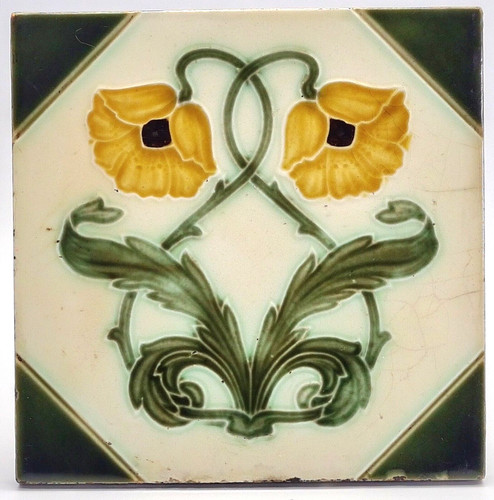 Antique fireplace tile - tile, moulded