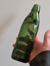 DARK GREEN 10OZ CODD BOTTLE FROM STAMFORD IN VERY GOOD CONDITION.
