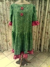 Panto Dame  Green  material, 54" chest, Pink ribbon