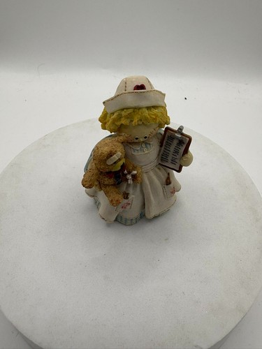 Enesco mary rhyner - by,