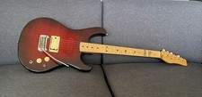 Unbranded vintage 80’s guitar strat. Made in Japan. Solid wood, customised.